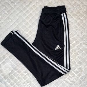 YM NWOT Adidas track pants. Ankle and front zips.